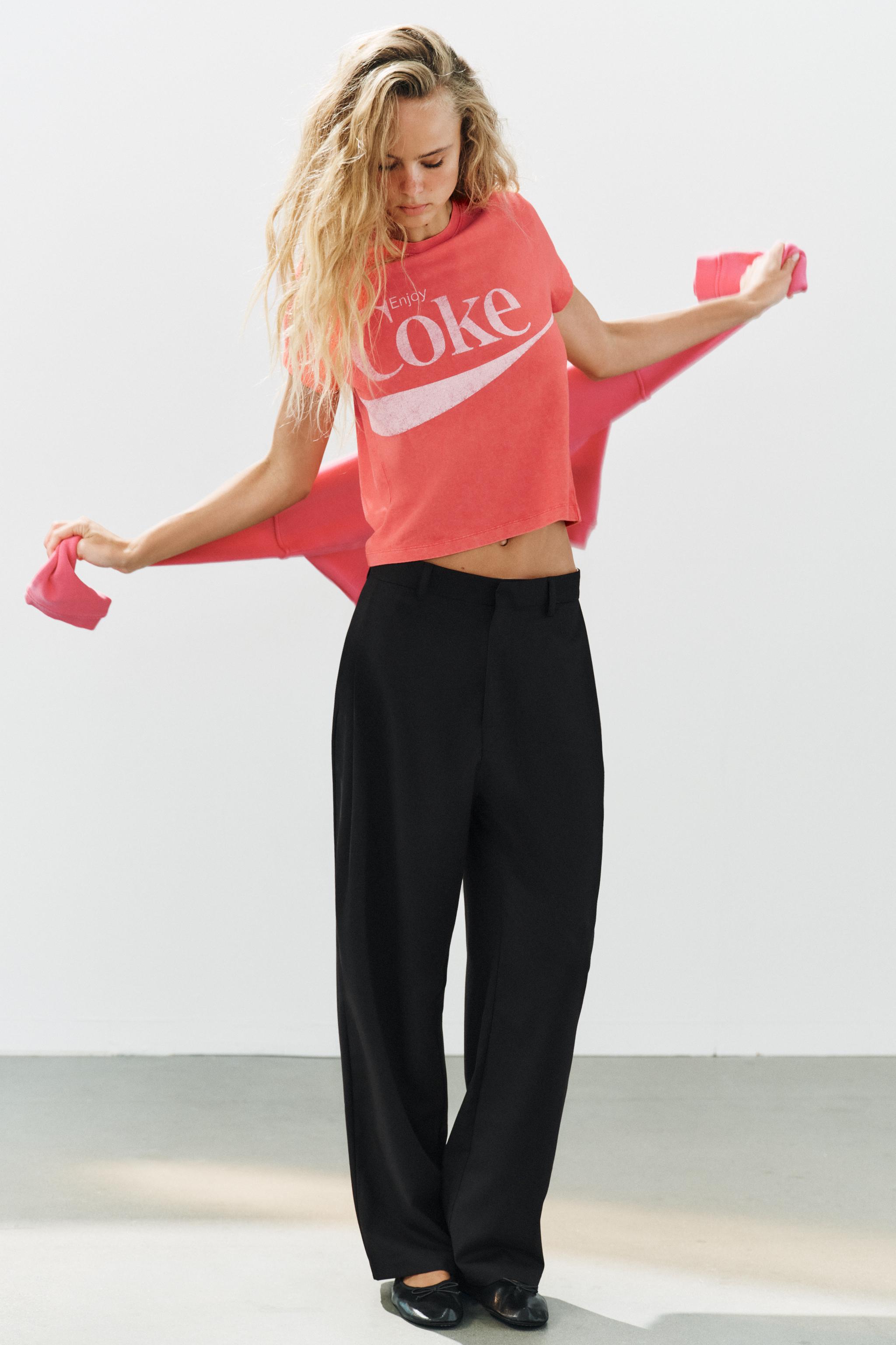 STRIPED PLEATED PANTS
